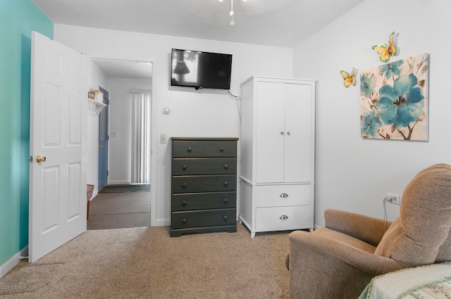 sitting room featuring carpet flooring