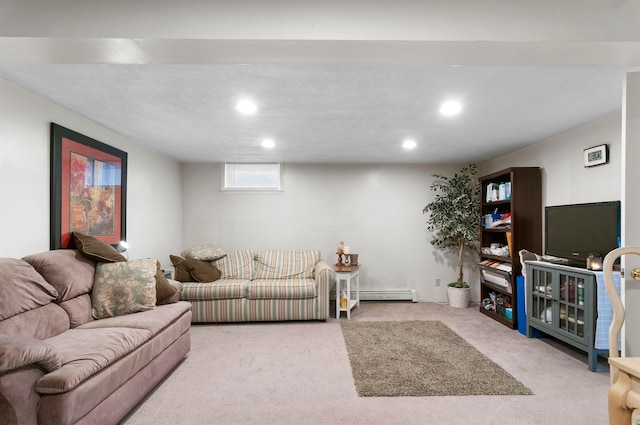 living room featuring light colored carpet and a baseboard heating unit