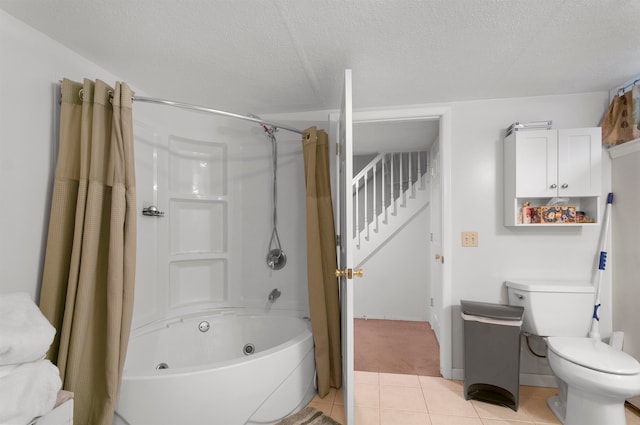 bathroom featuring toilet, a textured ceiling, tile patterned floors, and shower / bathtub combination