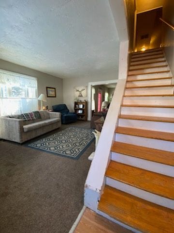 interior space featuring a textured ceiling