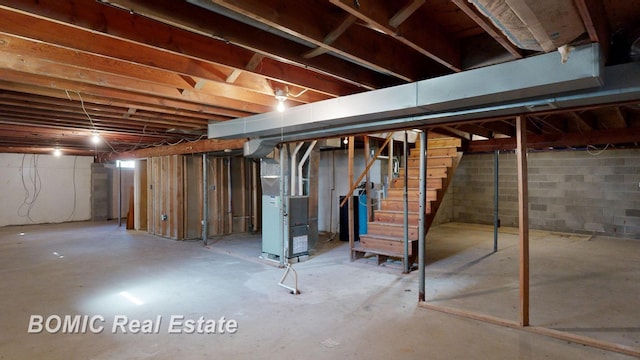 basement featuring heating unit