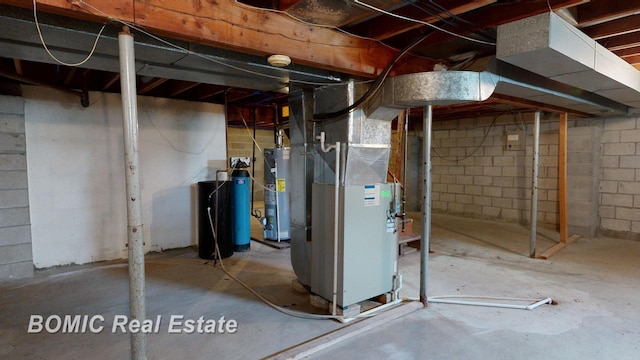 basement with gas water heater and heating unit