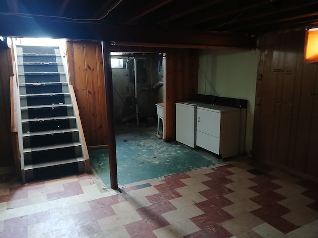 basement featuring washing machine and dryer