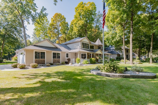 rear view of house with a lawn