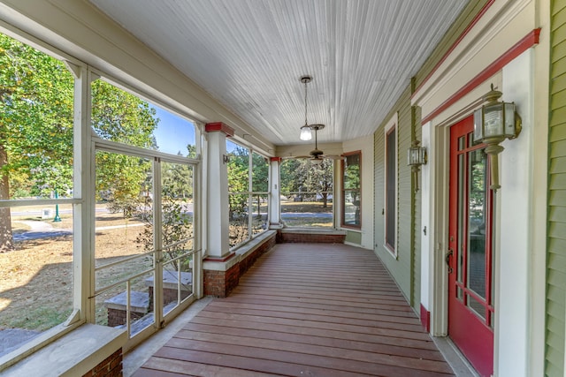 unfurnished sunroom with a healthy amount of sunlight