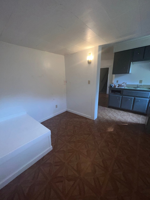 interior space featuring dark parquet floors