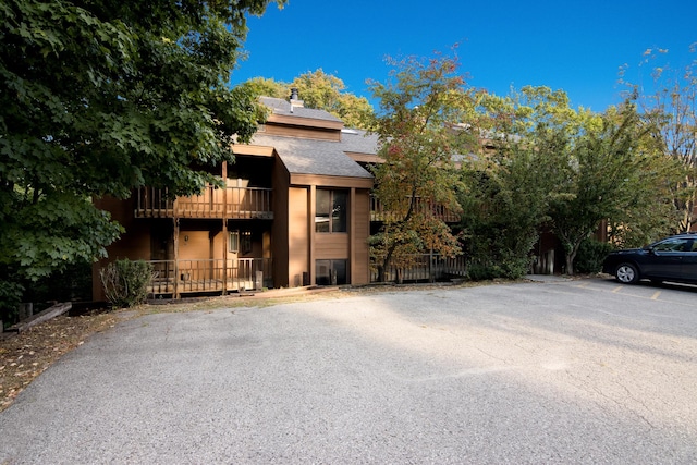 5830 Shanty Creek Rd, Bellaire, MI 49615 - view of property featuring uncovered parking