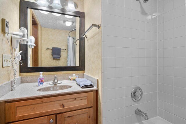 5830 Shanty Creek Rd, Bellaire, MI 49615 - full bathroom with vanity and shower / bath combo with shower curtain