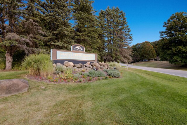 5830 Shanty Creek Rd, Bellaire, MI 49615 - community sign with a lawn