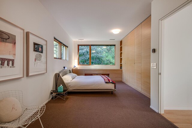 500 Belvedere Dr SE, East Grand Rapids, MI 49506 - carpeted bedroom with baseboards