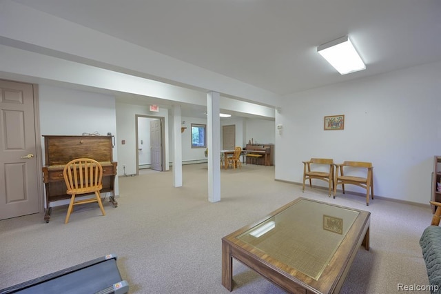 carpeted living room with baseboard heating