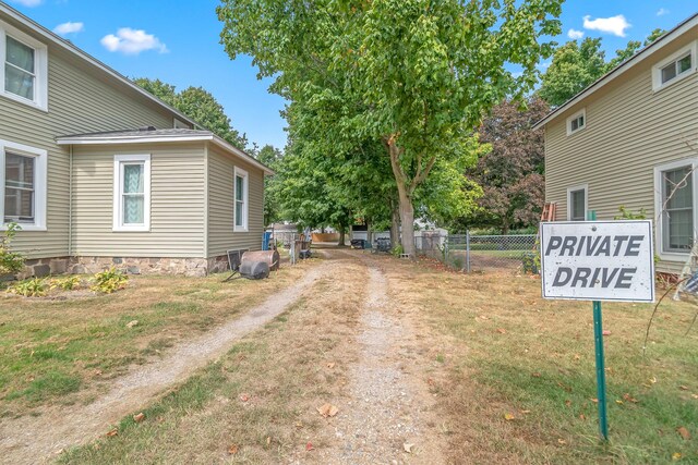 89 E Chicago St, Quincy, MI 49082 - view of yard with driveway