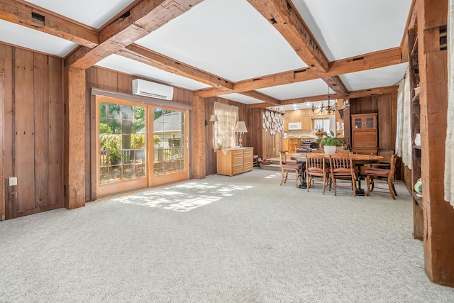 dining room with an AC wall unit, wood walls, light carpet, and beam ceiling