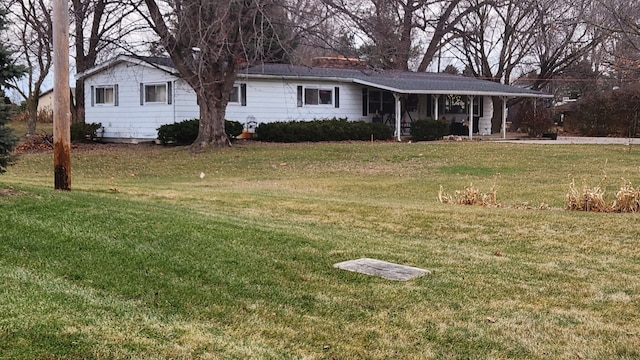 view of front of home with a front lawn