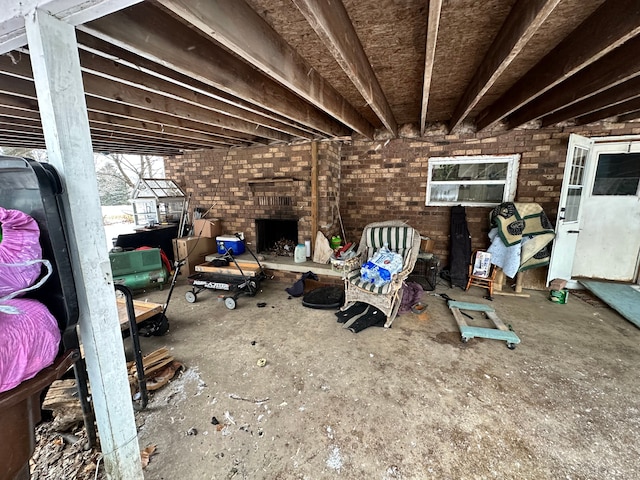 miscellaneous room with brick wall