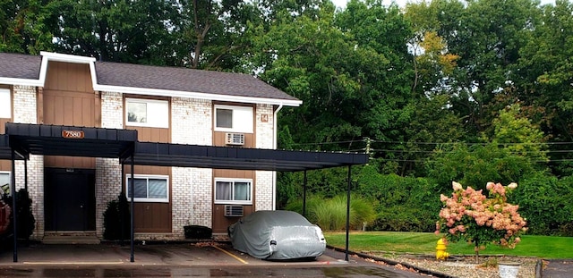 view of front facade featuring a carport