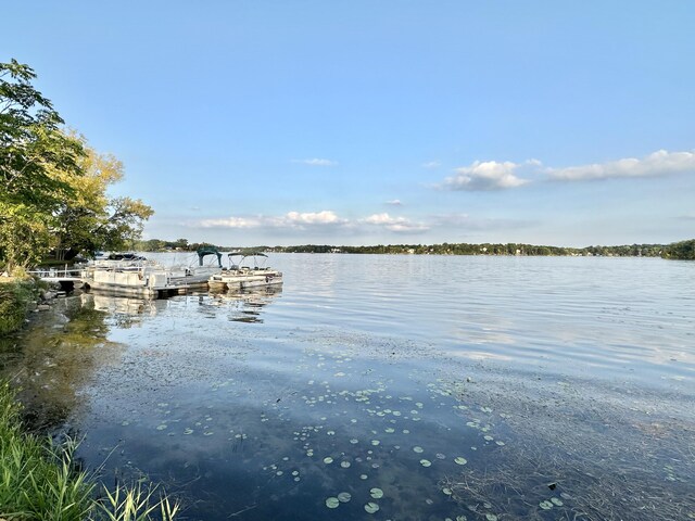 2715 Duck Lake Rd N, Highland, MI 48356 - dock area featuring a water view