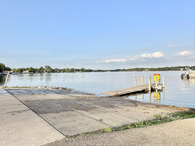 2715 Duck Lake Rd N, Highland, MI 48356 - dock with a boat ramp and a water view