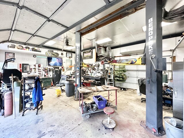 2715 Duck Lake Rd N, Highland, MI 48356 - garage with a workshop area