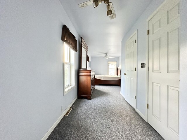 2715 Duck Lake Rd N, Highland, MI 48356 - hall with baseboards and carpet flooring