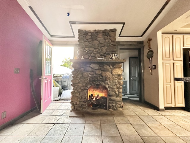 2715 Duck Lake Rd N, Highland, MI 48356 - living room with a fireplace, baseboards, and light tile patterned flooring
