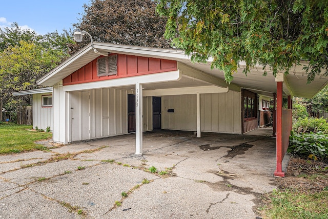 exterior space with a carport