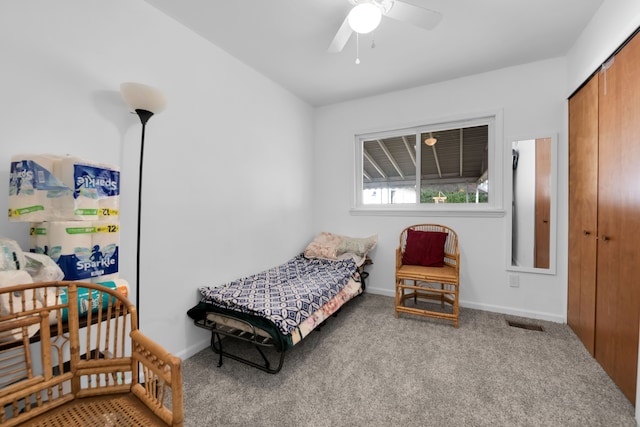 bedroom featuring carpet, a closet, and ceiling fan