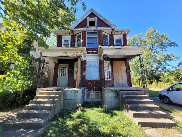 view of front of home featuring covered porch