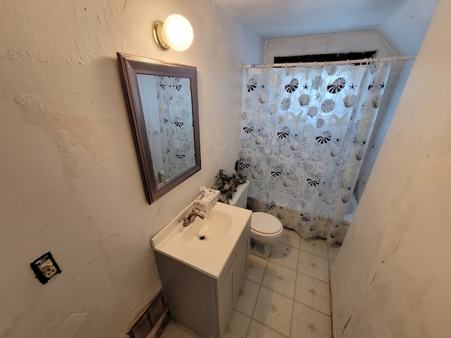 full bathroom featuring vanity, toilet, and shower / bath combo with shower curtain