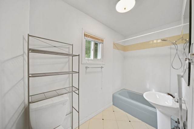 bathroom featuring toilet and tub / shower combination