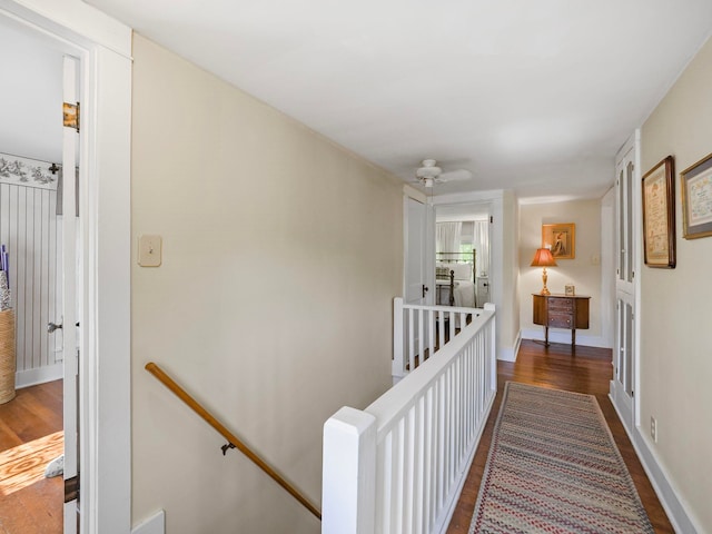 hallway featuring dark wood-type flooring