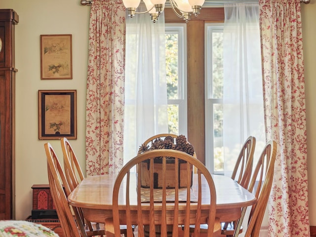 dining room with a chandelier