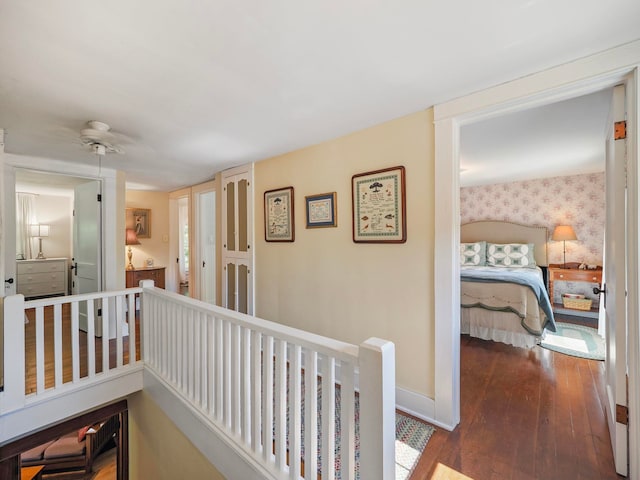 corridor featuring dark hardwood / wood-style floors