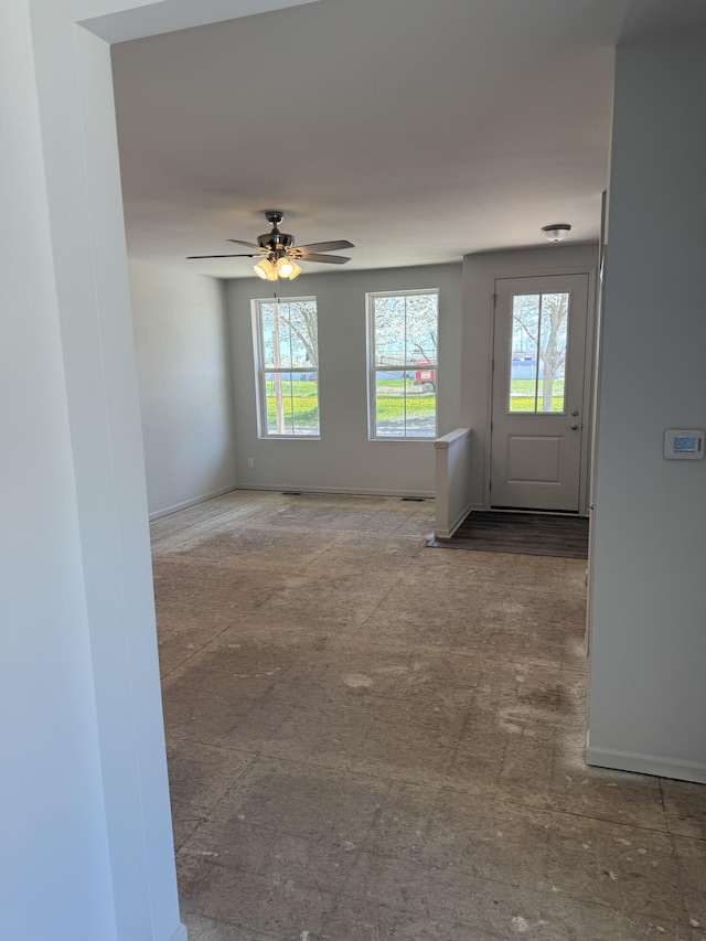411 Mason Run Blvd, Monroe, MI 48162 - unfurnished room featuring baseboards and a ceiling fan