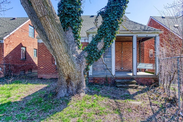 view of property exterior with a porch