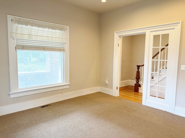 empty room with carpet floors