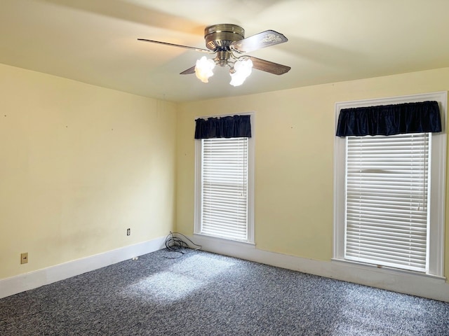 empty room with carpet and ceiling fan