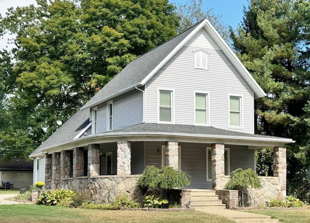 view of front of home featuring covered porch