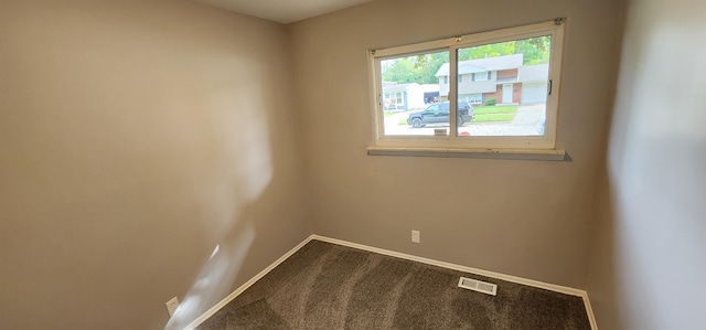 empty room featuring carpet flooring