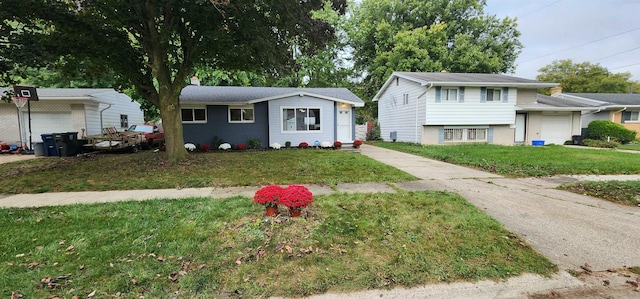 view of front of home with a front lawn