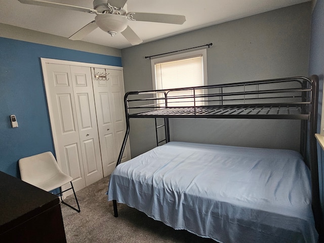 bedroom featuring carpet, ceiling fan, and a closet