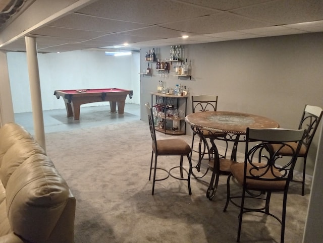 carpeted dining room featuring bar area, a drop ceiling, and billiards