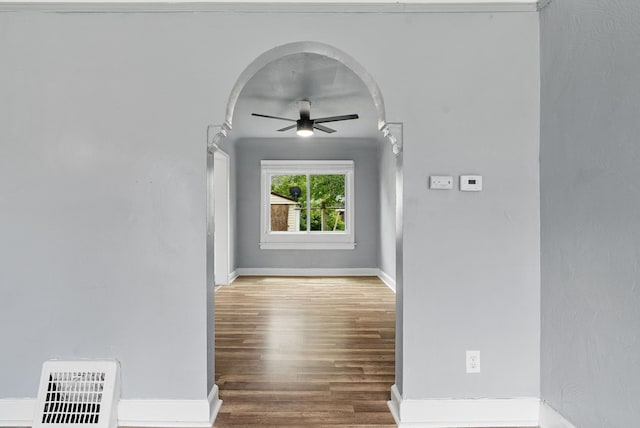 corridor featuring hardwood / wood-style flooring