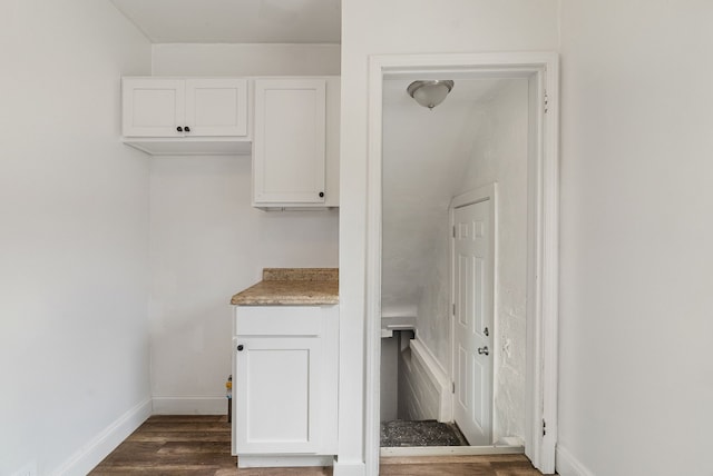 interior space with dark hardwood / wood-style floors