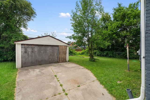 garage with a yard