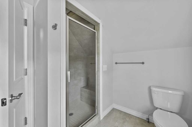 bathroom featuring toilet and walk in shower