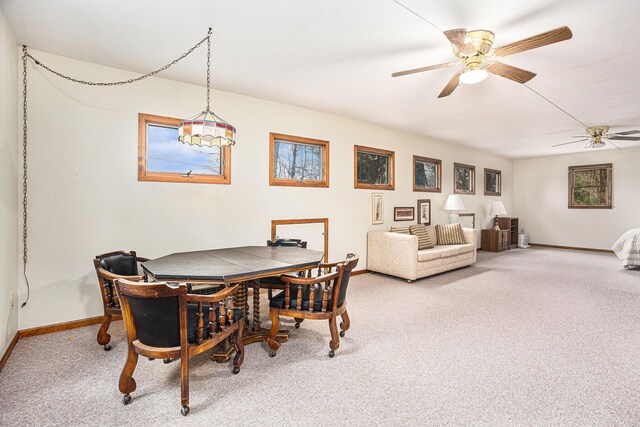 1875 Edwin Dr, Wayland, MI 49348 - carpeted dining room featuring baseboards, ceiling fan, and a desk