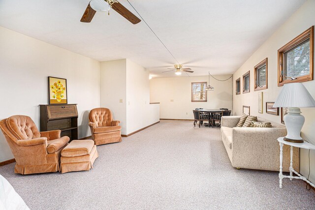 1875 Edwin Dr, Wayland, MI 49348 - carpeted living room featuring a ceiling fan and baseboards