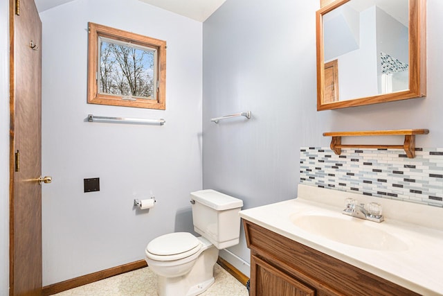 1875 Edwin Dr, Wayland, MI 49348 - bathroom featuring tasteful backsplash, toilet, baseboards, and vanity