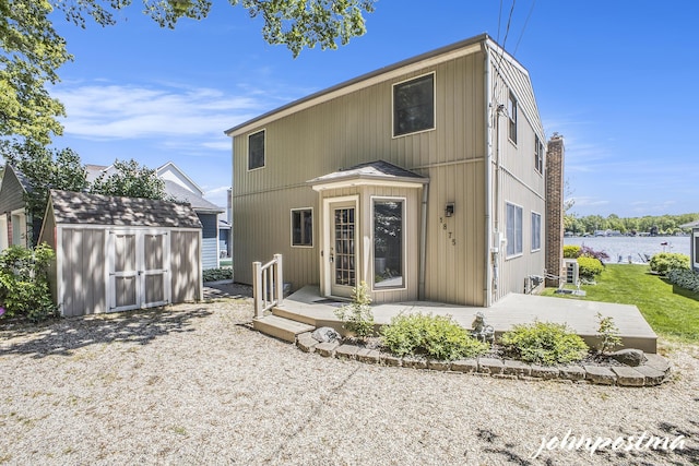 1875 Edwin Dr, Wayland, MI 49348 - back of house with a water view and a patio area